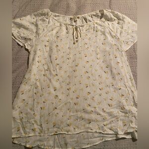 Medium. Yellow cherry blouse.